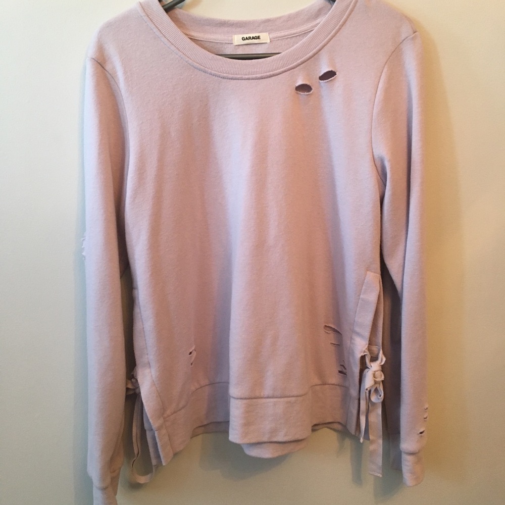 Garage ripped design sweater